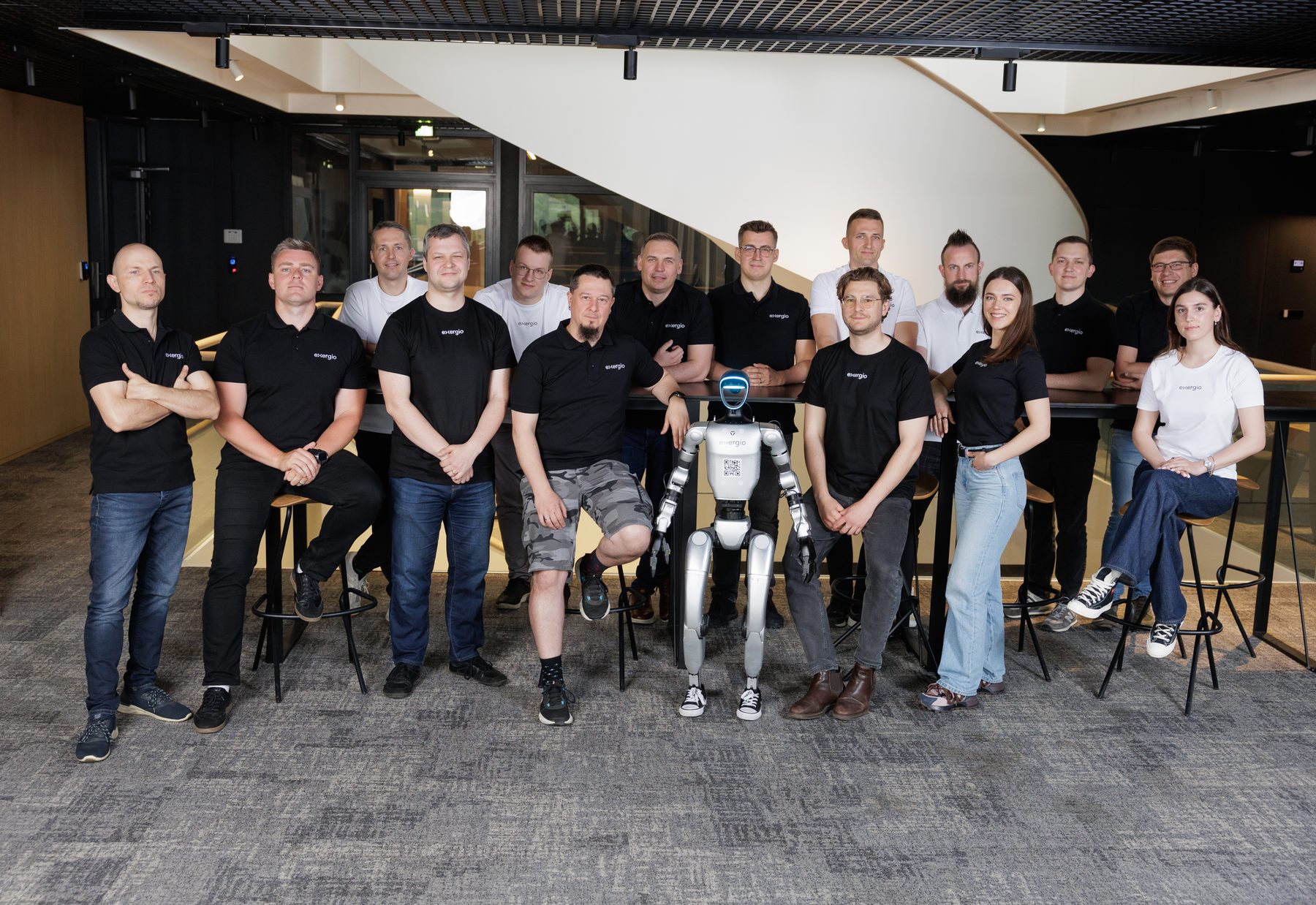 The Exergio team with Gio, the humanoid robot